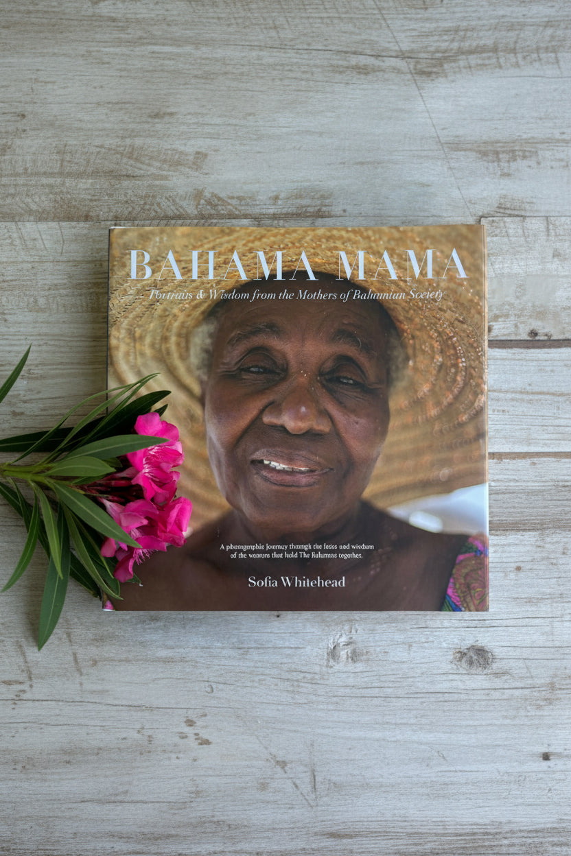 Book titled 'Bahama Mama' with a woman's face on the cover, featuring a straw hat and pink flowers.