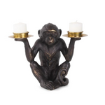 Monkey candle holder with two candle holders.