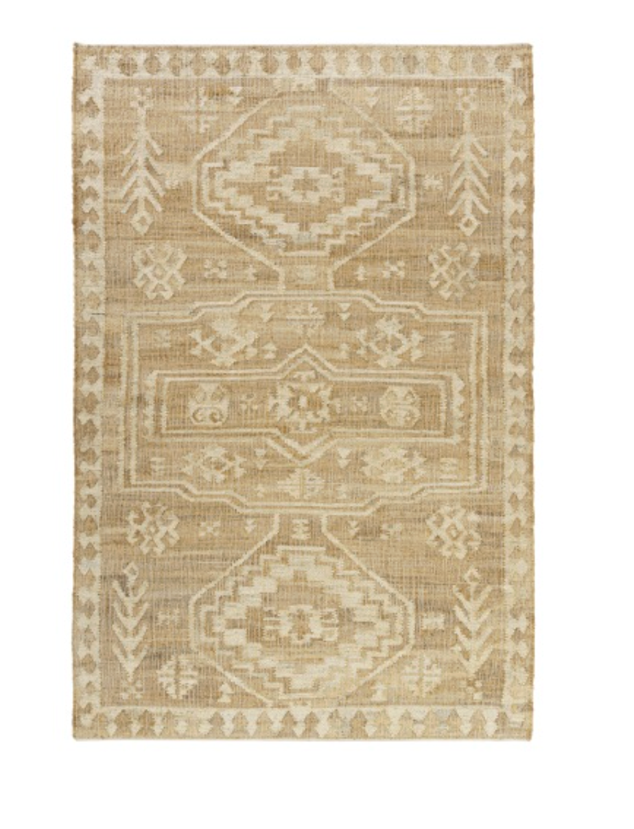 Beige and brown patterned rug.