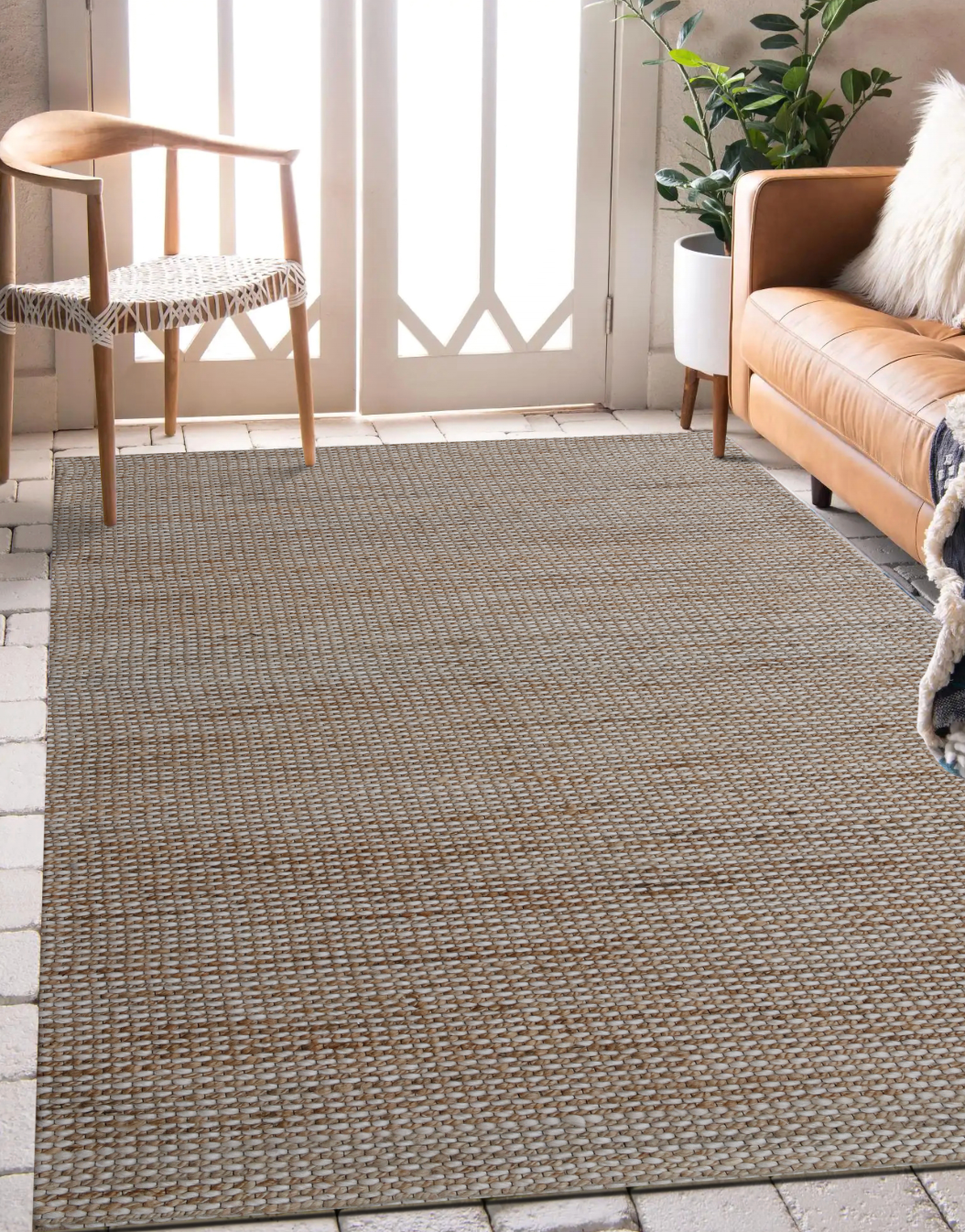 Display of a beige natural rug .