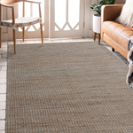 Display of a beige natural rug .