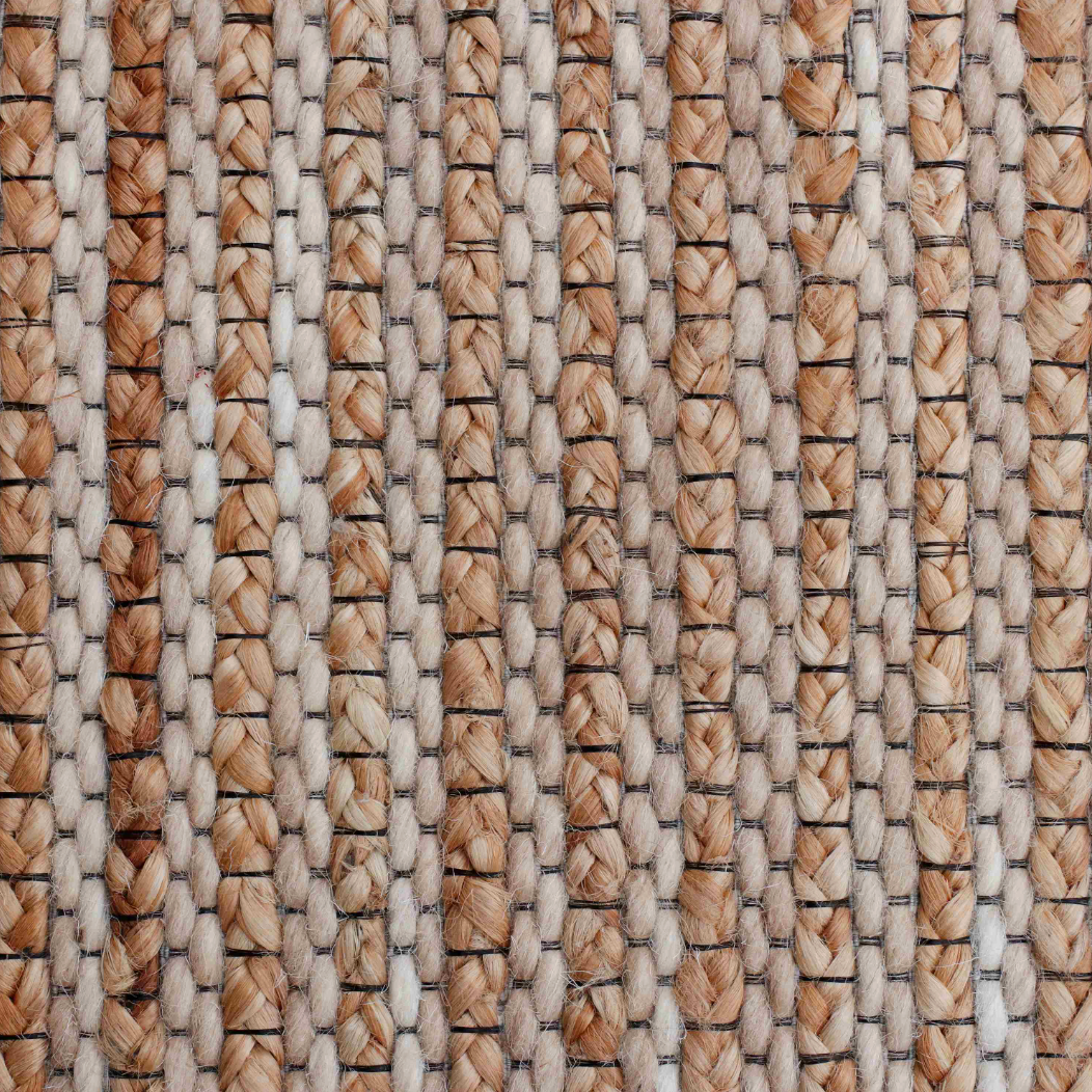 Close-up of woven beige and brown patterned fabric