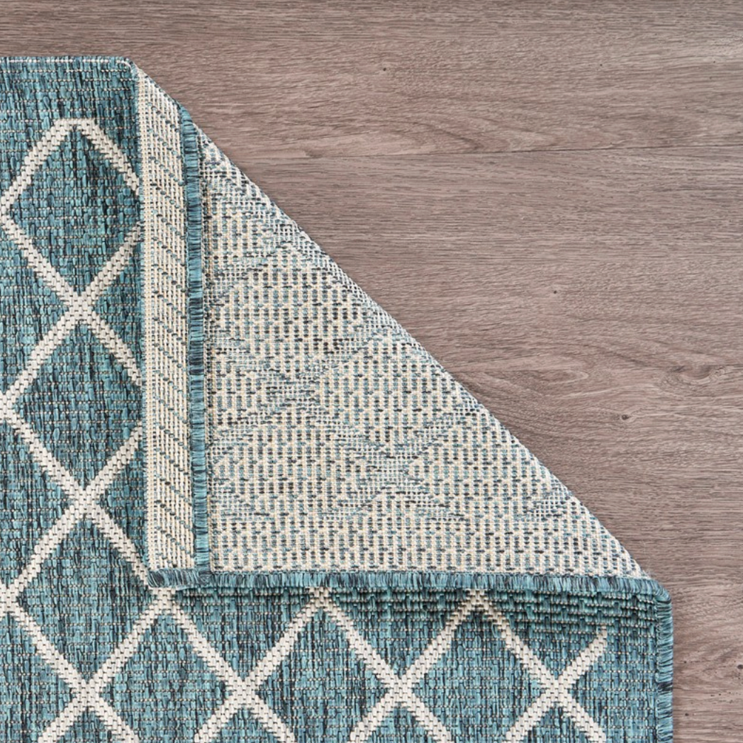 Blue geometric-patterned rug 