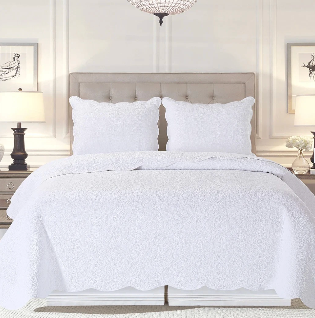 White quilted comforter set.