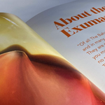 An open book or magazine page showing a close-up photograph of a red and orange flower, with the headline 'About the Exumas' printed in brown text on the right page.