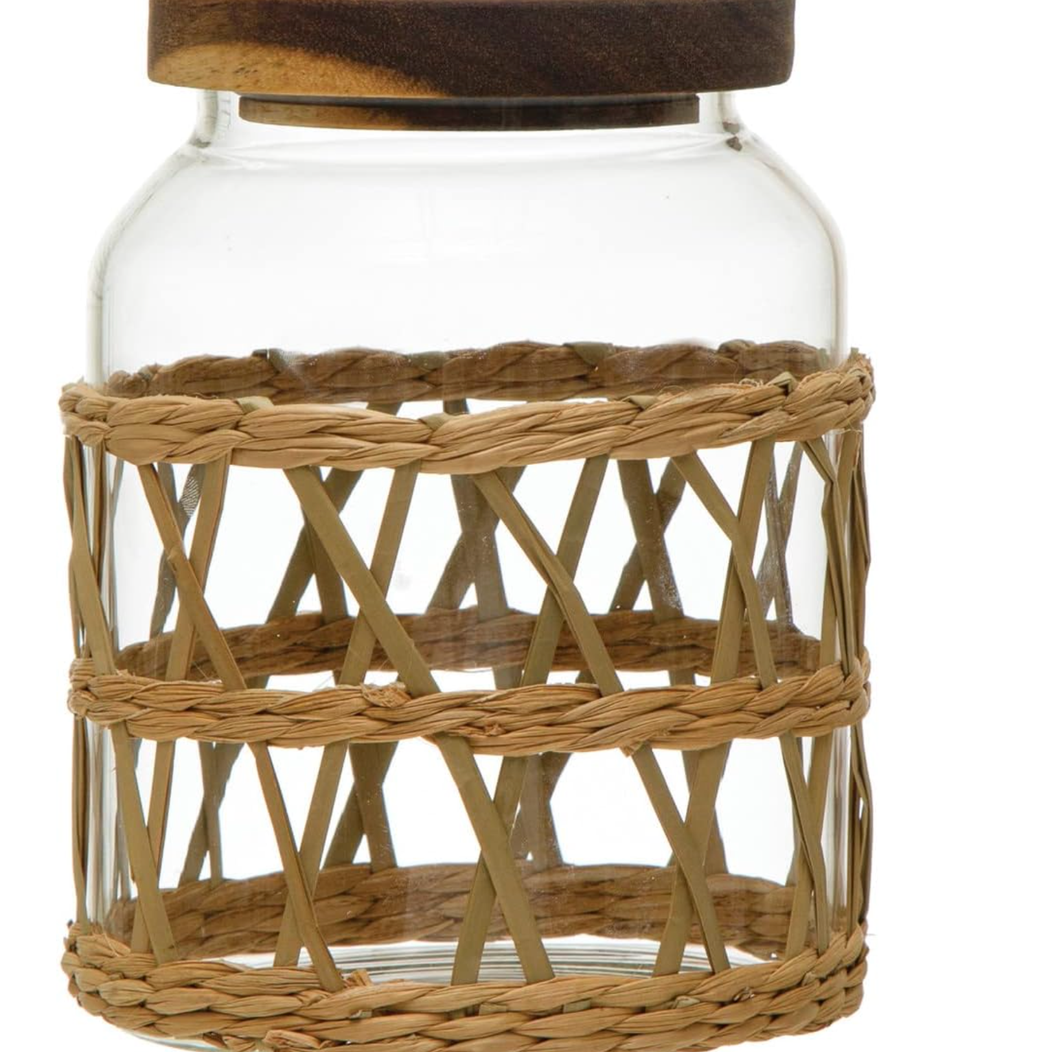 A clear glass jar with a dark brown wooden lid and a natural woven rattan or wicker sleeve around the body.