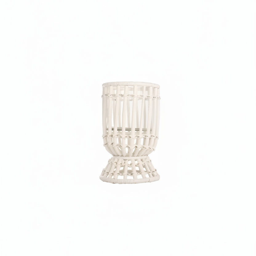 A white hurricane lamp with a woven design, featuring a removable glass insert.