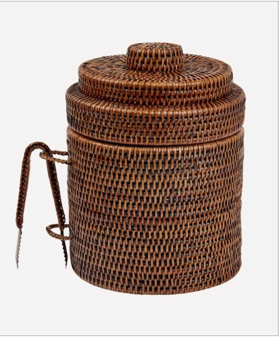A round brown wicker ice bucket.