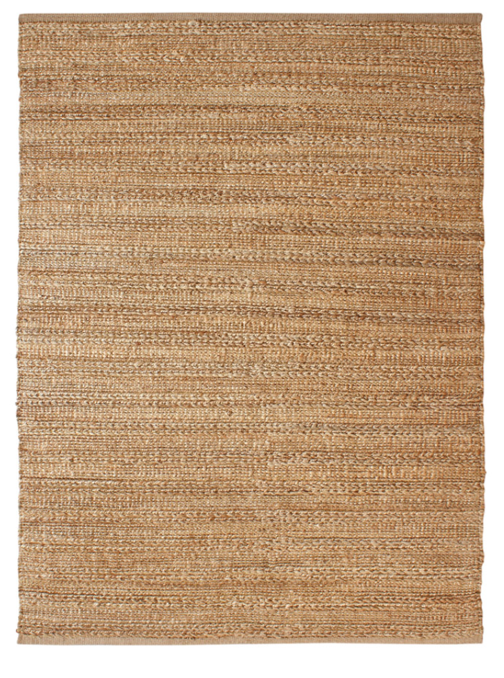 Beige woven rug