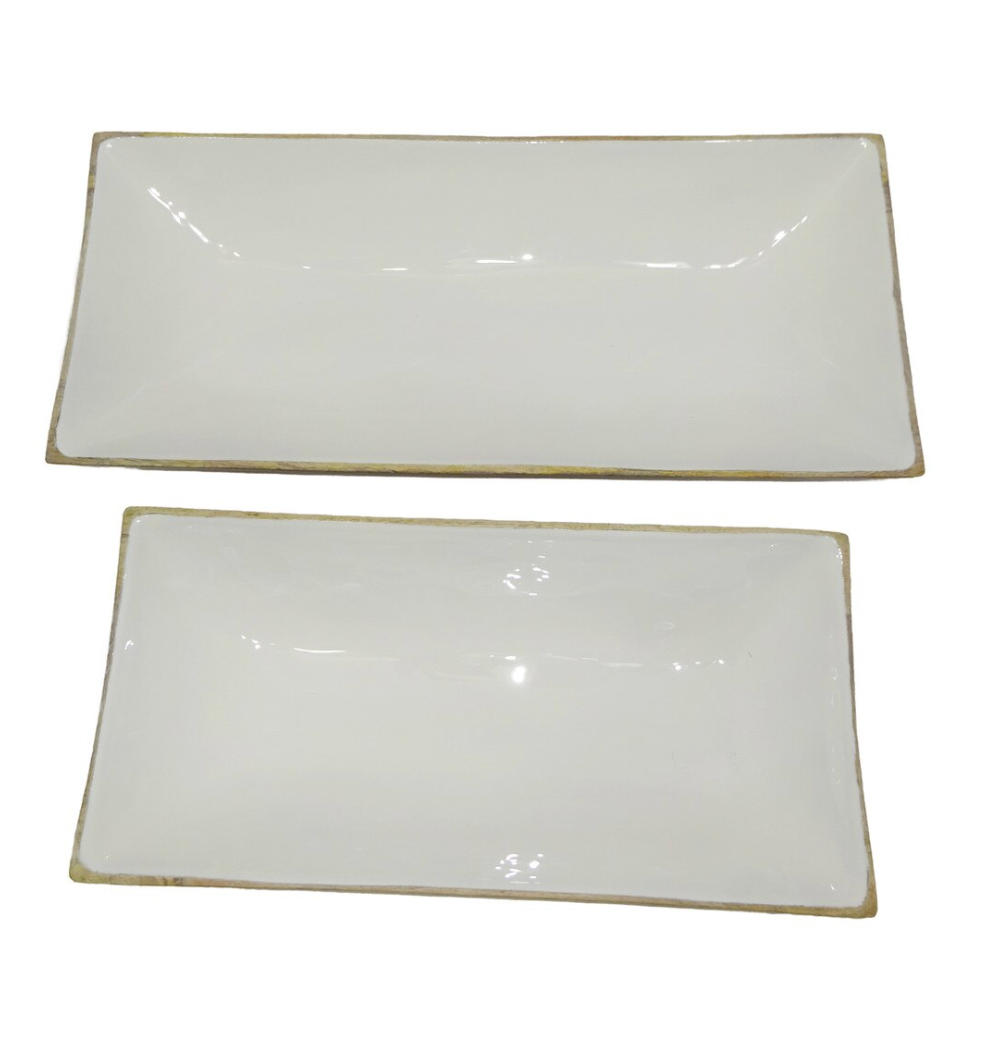 Two rectangular glossy white ceramic serving platters.