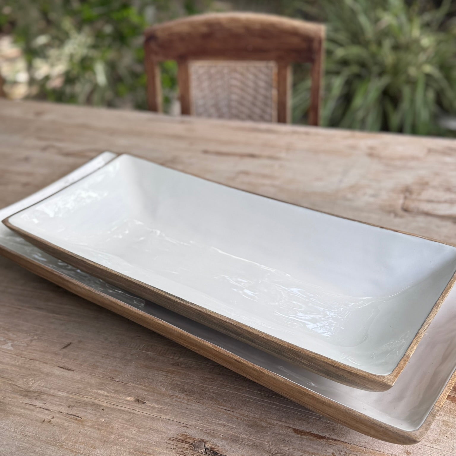 Two white ceramic trays.
