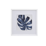 Framed botanical wall art featuring a single large monstera leaf 