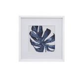 Framed botanical wall art featuring a single large monstera leaf 