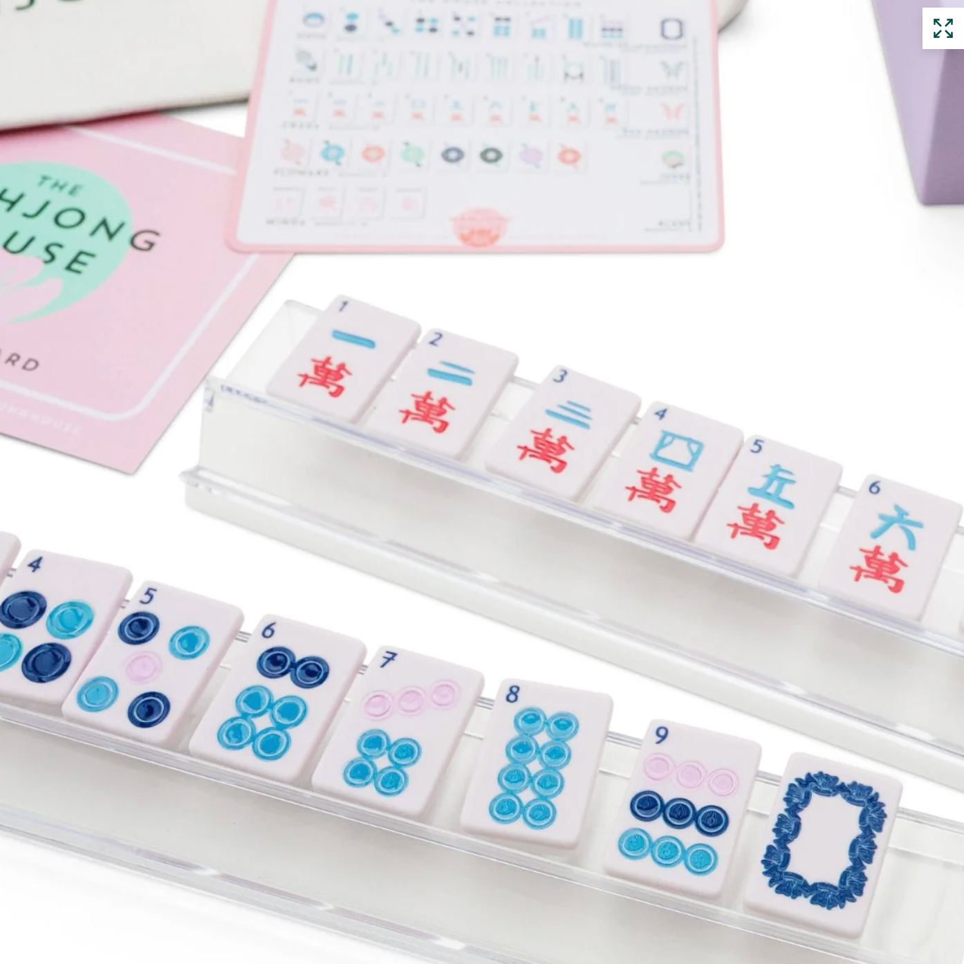 Set of tiles with numbers and symbols.