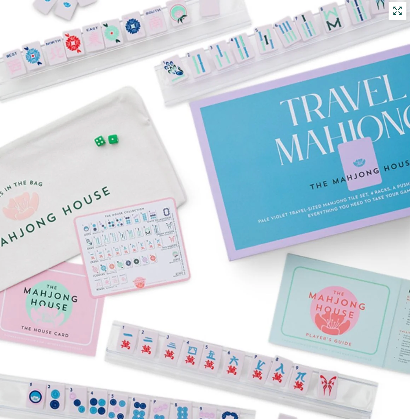 Travel mahjong set with packaging and components.