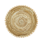 Round woven placemat with bead border with shells.