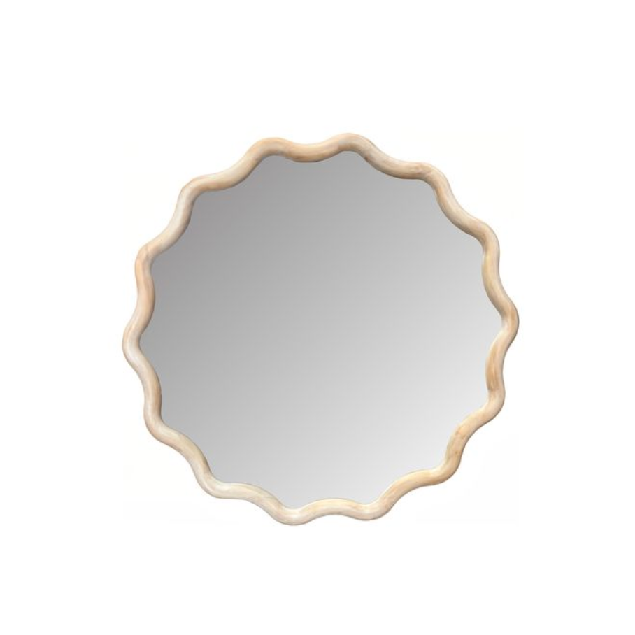Round mirror with a decorative beige frame.