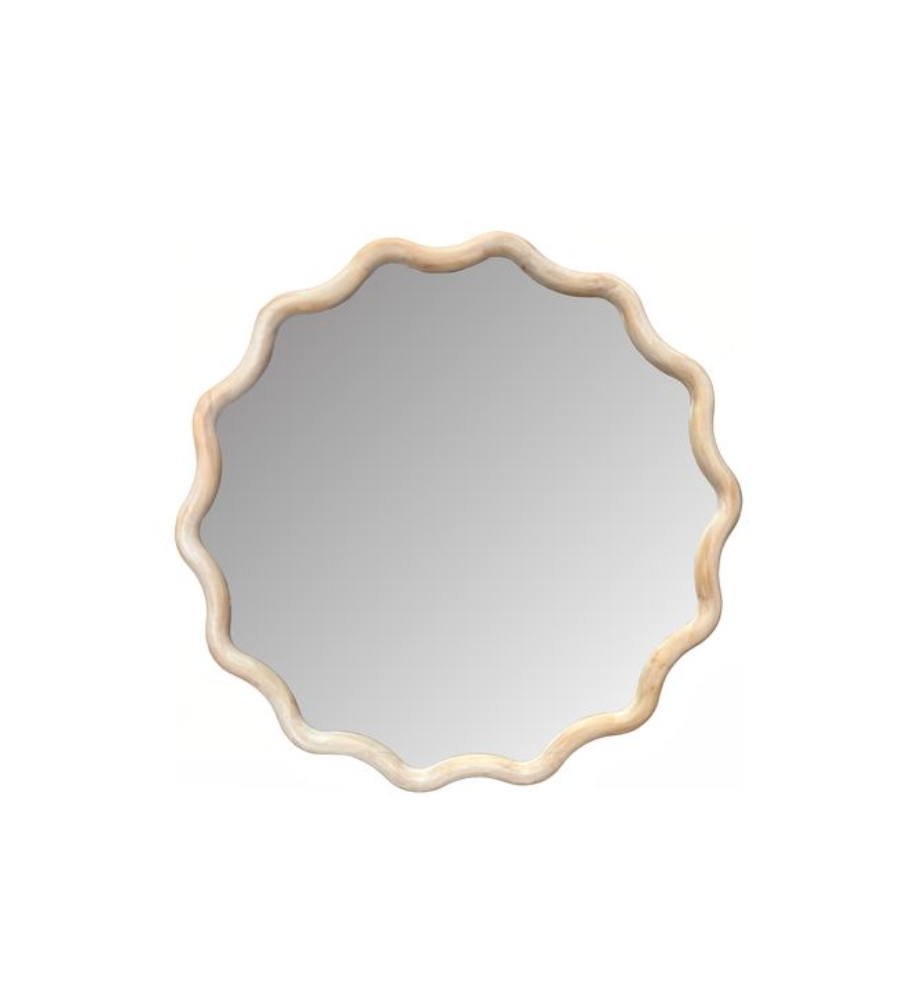 Round mirror with a decorative beige frame.