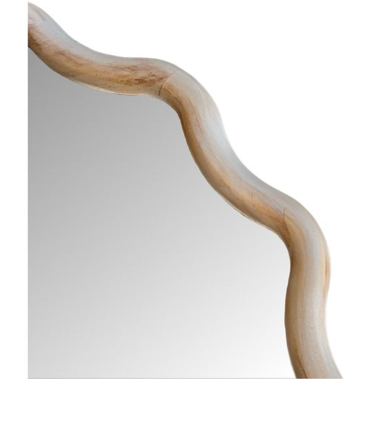Decorative mirror with wavy wooden frame.