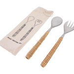 Bamboo-handled stainless steel salad spork and fork set.