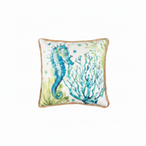 Square decorative throw pillow featuring a watercolor-style blue seahorse and coral reef, finished with a natural tan jute border.