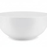 A white, round, melamine serving bowl .