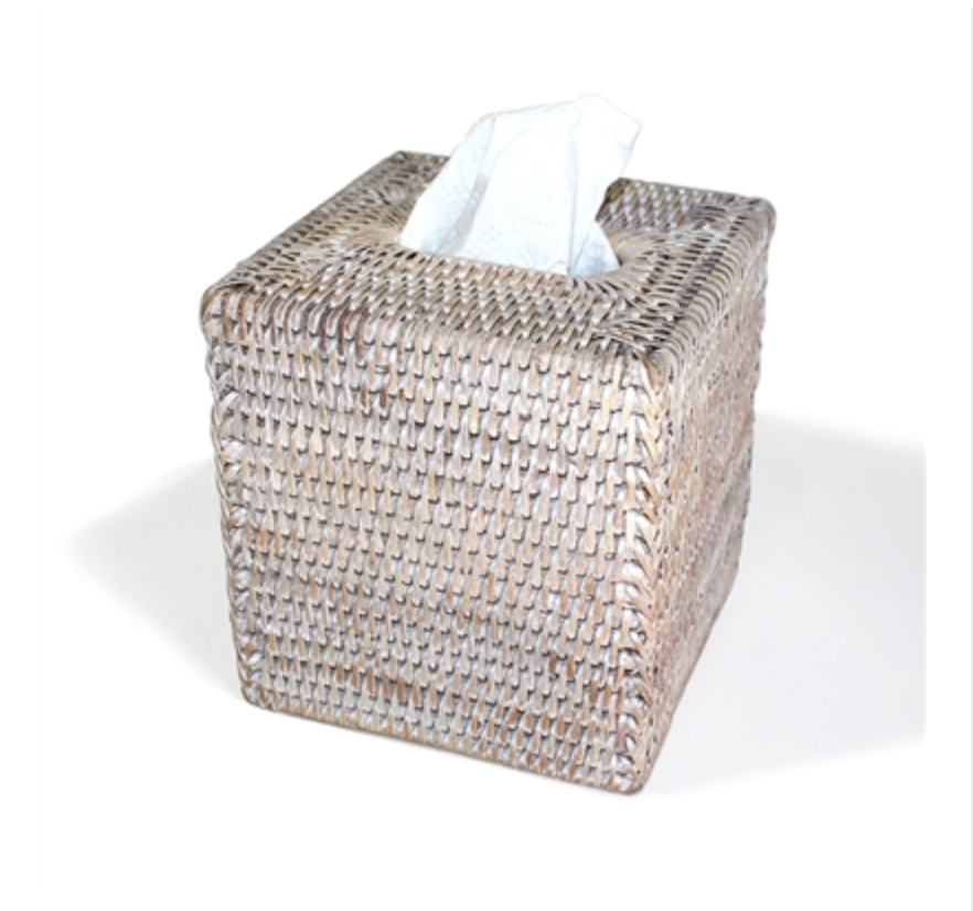 Woven tissue box cover with tissues.