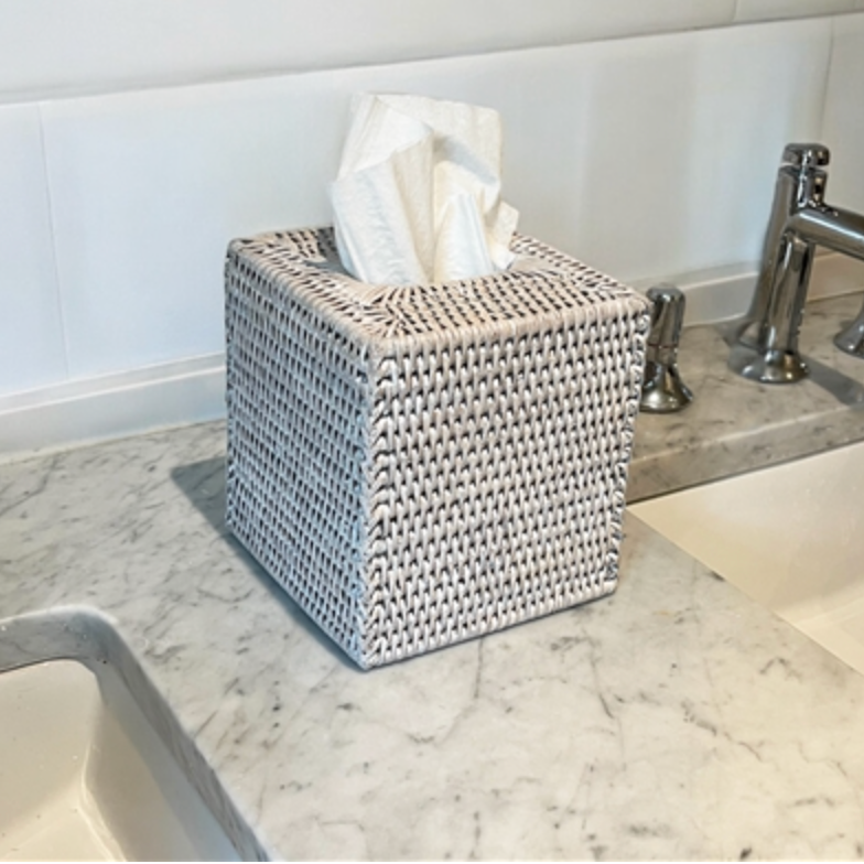 Woven tissue box holder.