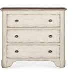 White distressed dresser with three drawers.