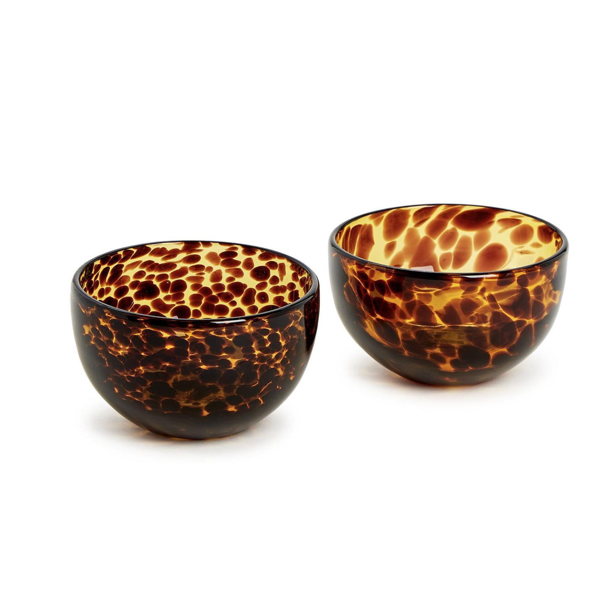 Two tortoiseshell-patterned bowls .