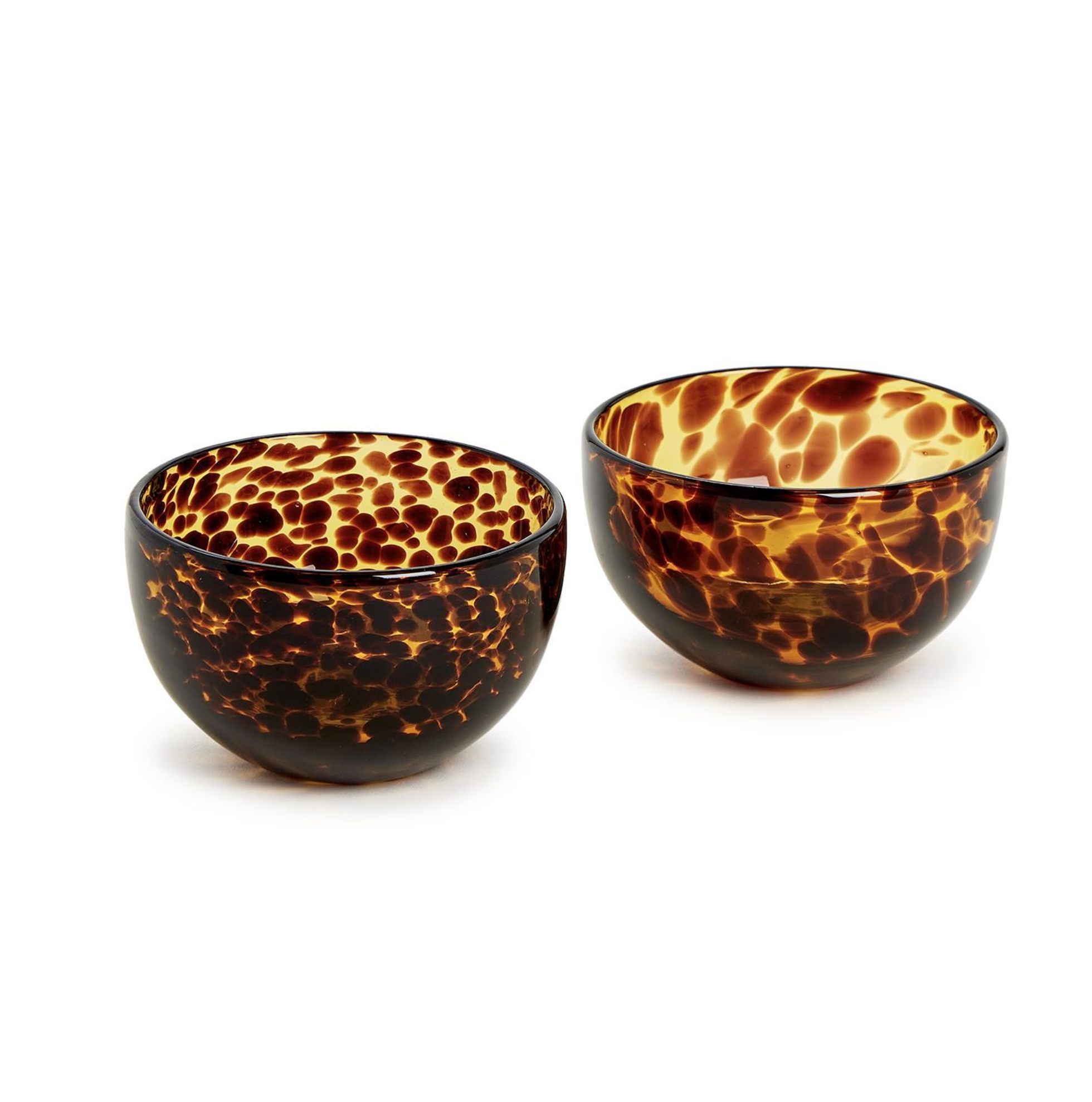 Two tortoiseshell-patterned bowls .