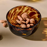 Glass bowl with tortoiseshell pattern.