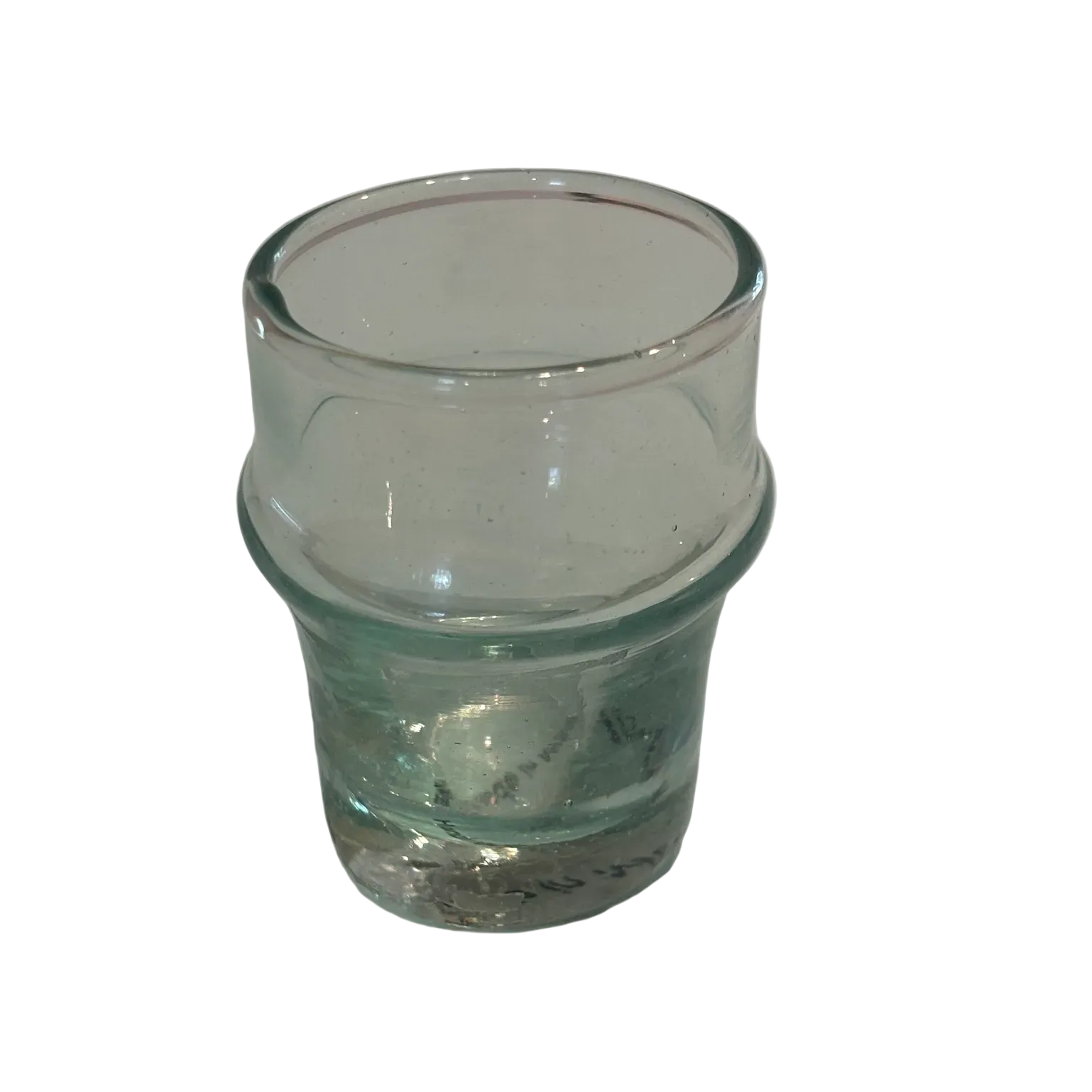 Clear glass shot cup.