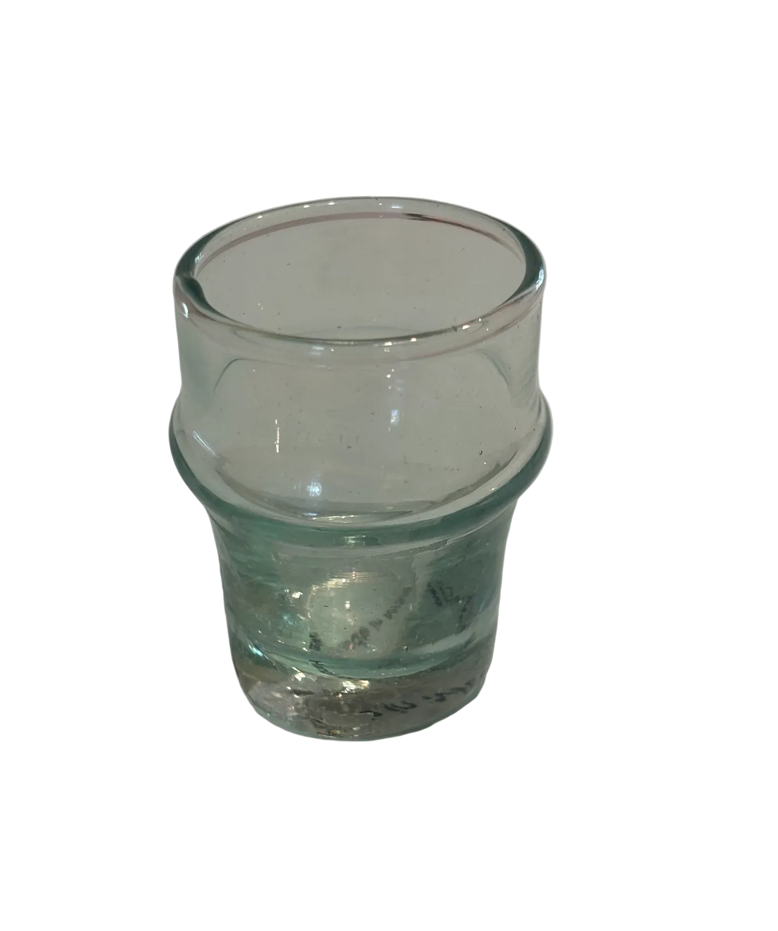Clear glass shot cup.