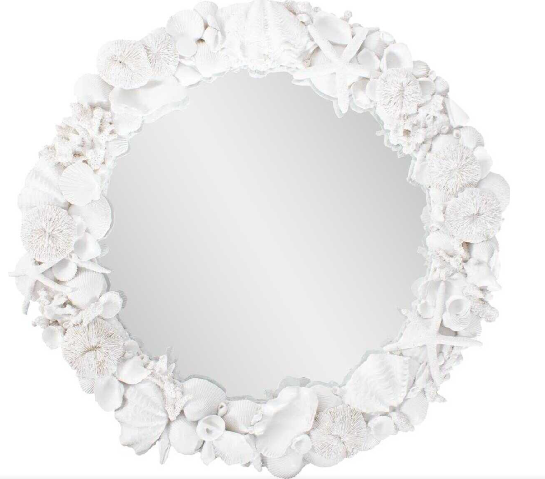 Round mirror with a decorative white shell frame.