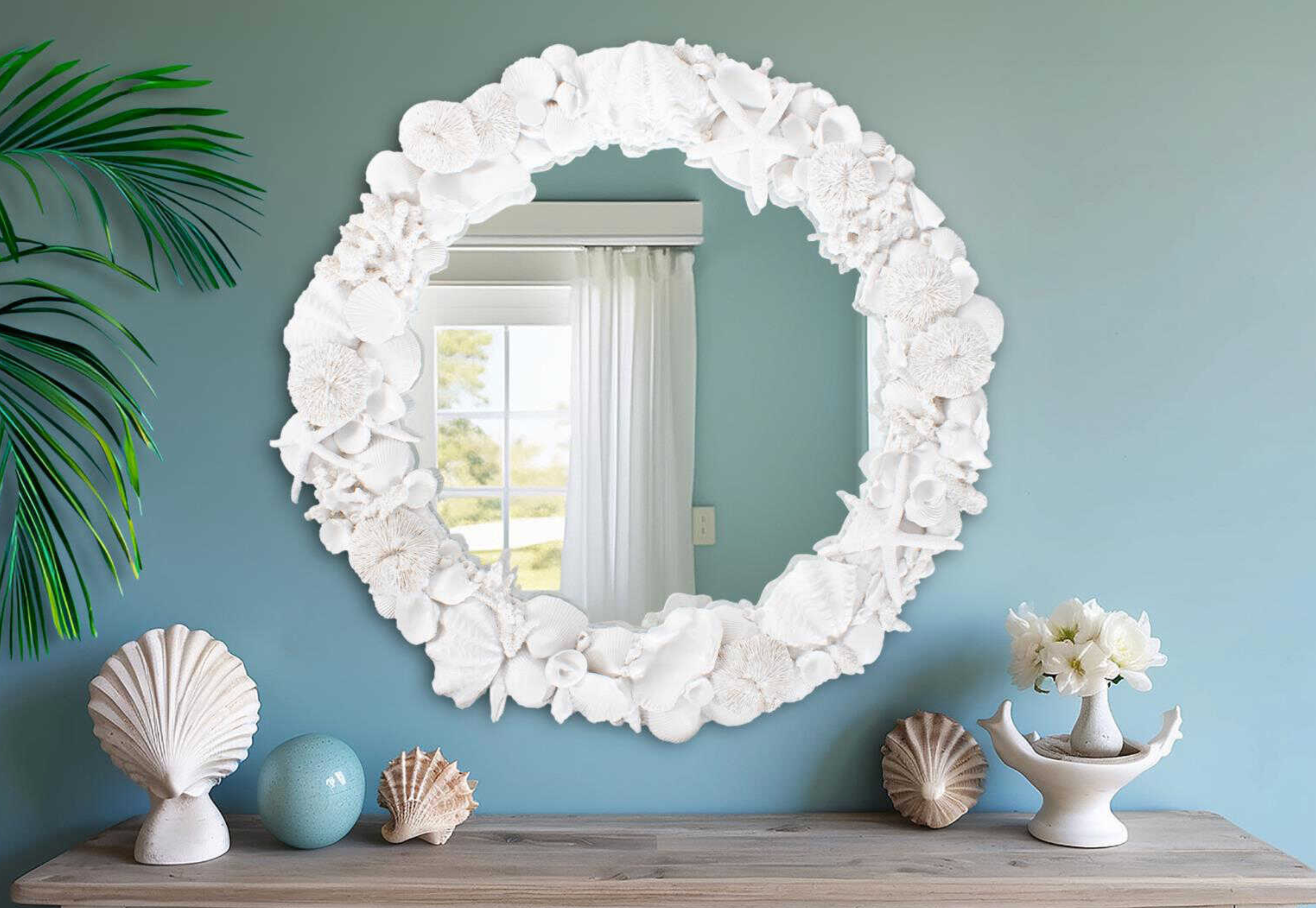 Decorative mirror with shell design.
