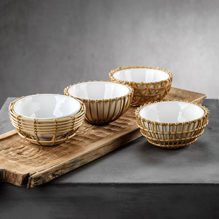 Set of four ceramic bowls with rattan-like rims.