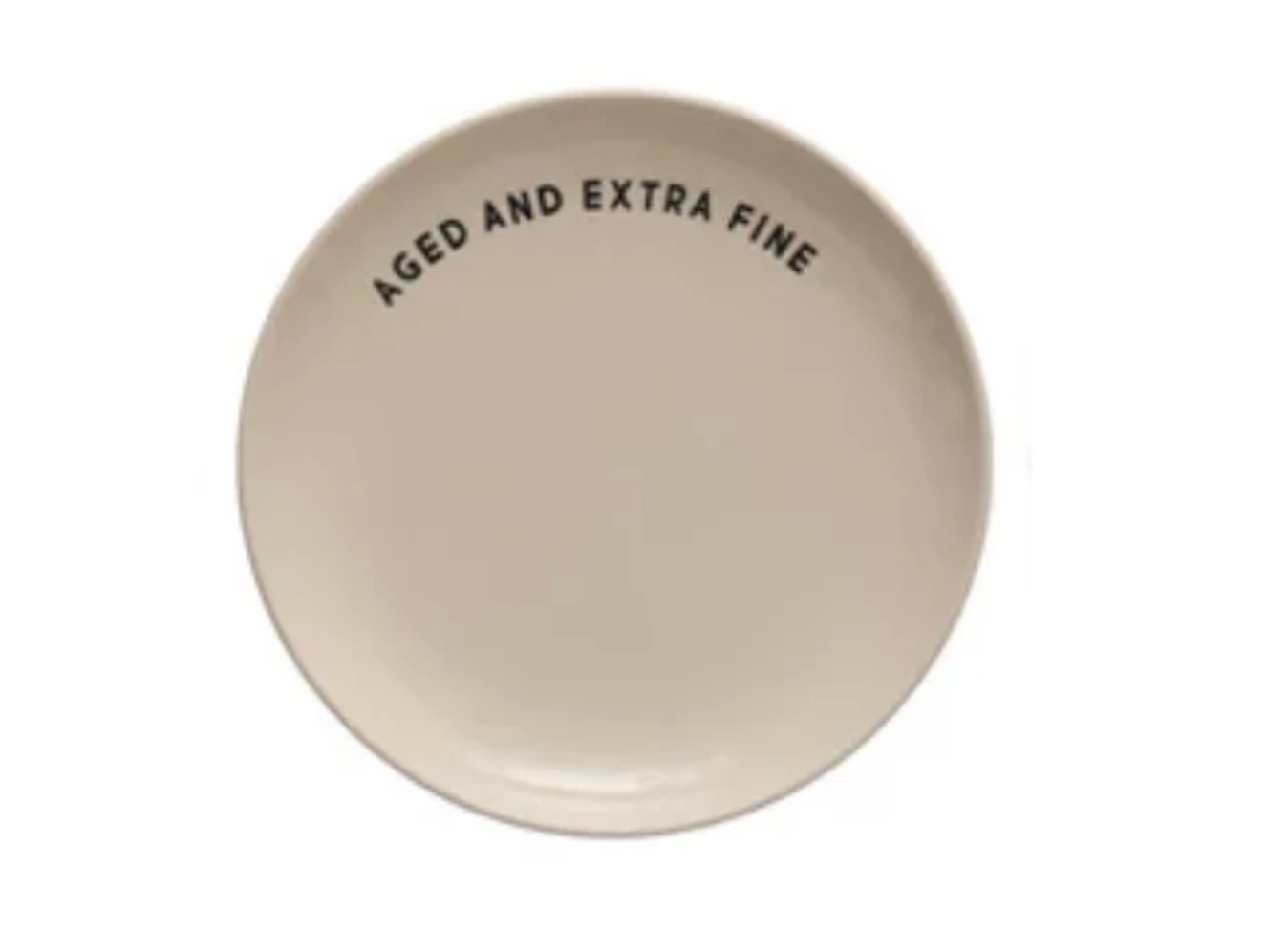 A round off-white ceramic plate with the text 'AGED AND EXTRA FINE' printed in black.