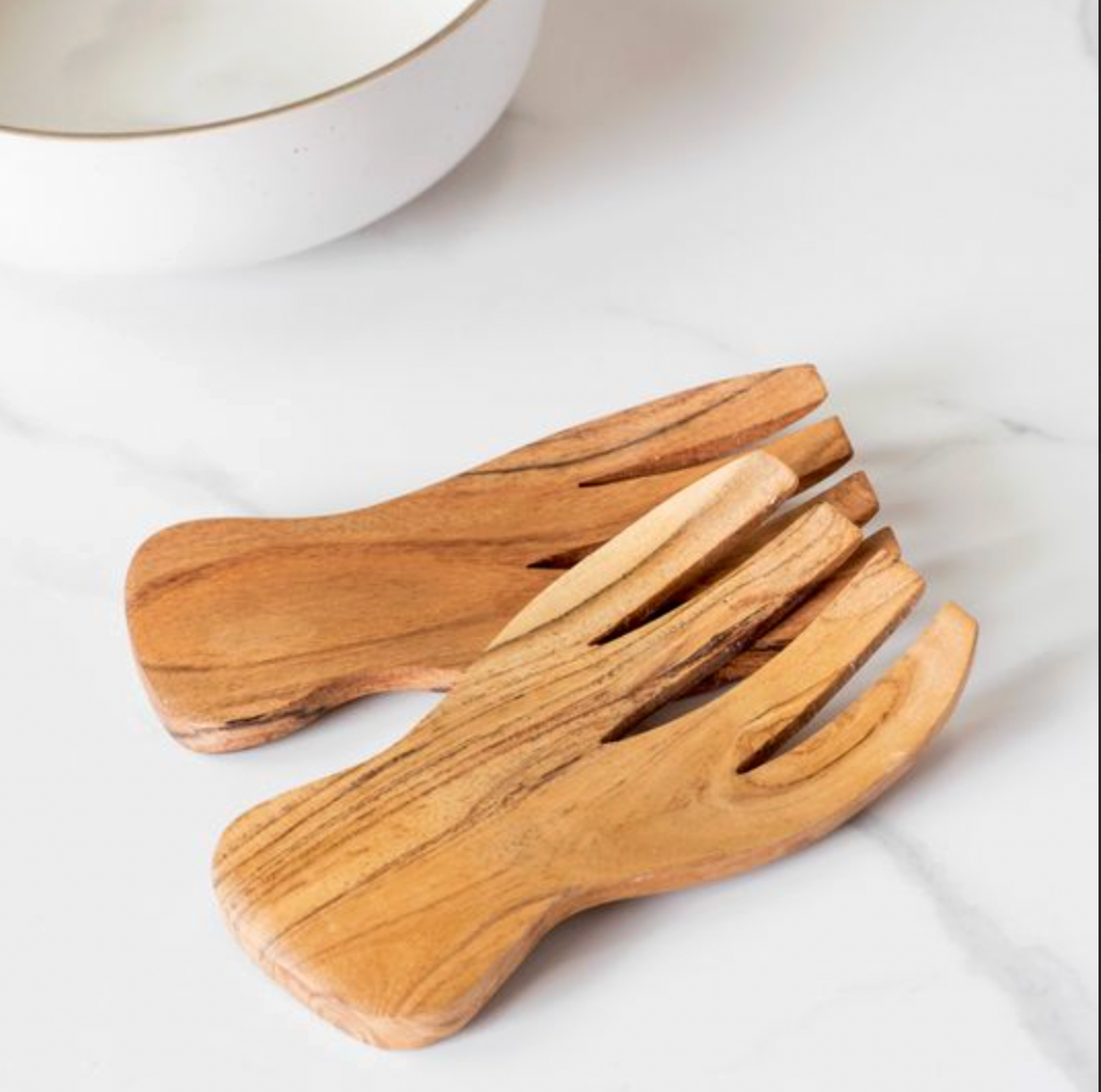 Wooden salad servers .